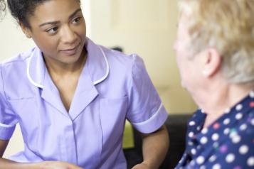 Nurse with older female patient