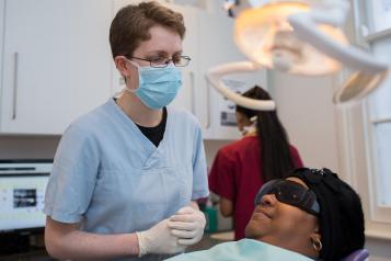 Dentist with a patient