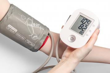 Blood pressure monitor on a person's arm