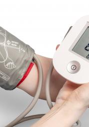 Blood pressure monitor on a person's arm